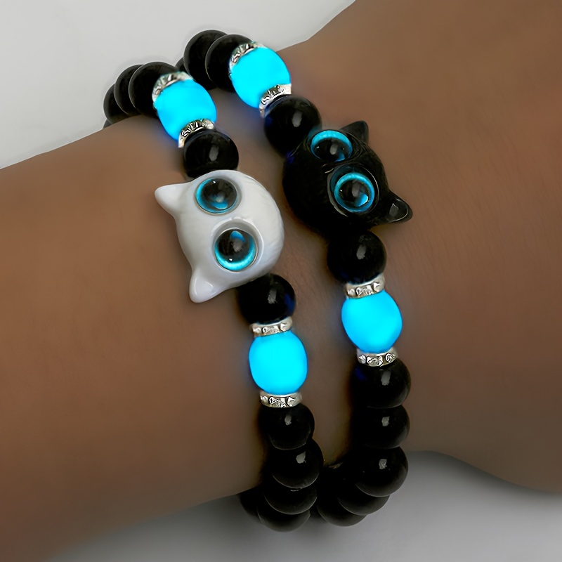Set di 2 braccialetti luminosi con perline a forma di gatto…