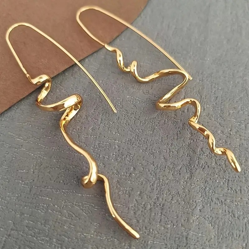 Orecchini Niche di Alta Gamma con Linee Artistiche Twisted…