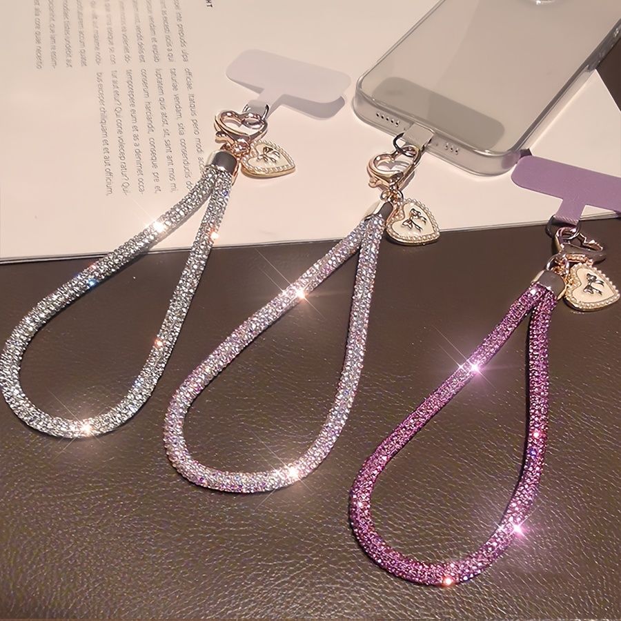 Un laccio di lusso per cellulare decorato con diamanti…